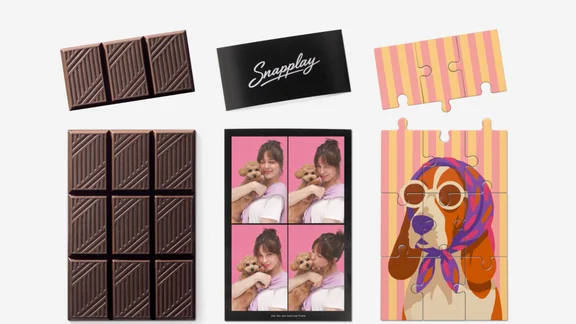 Chocolate, photos and a puzzle, all cut to a specific shape