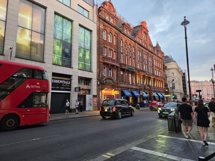 Busy London street at sunset