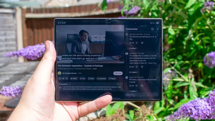 Samsung Galaxy Z Fold 8 unfolded, showing a video and comments