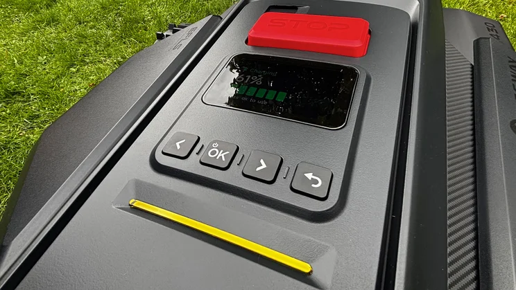 A closeup of the Segway Navimow X430 robot lawnmower's control panel