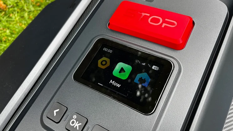 A closeup of the Segway Navimow X430 robot lawnmower's screen and control panel