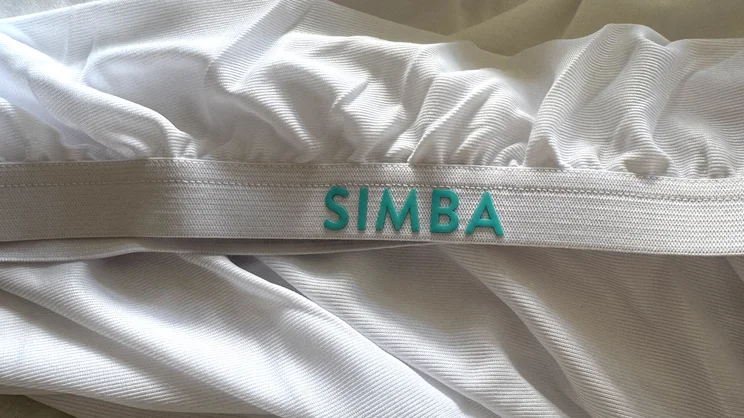 A closeup of the Simba TripleShield Bamboo mattress protector's elasticated skirt