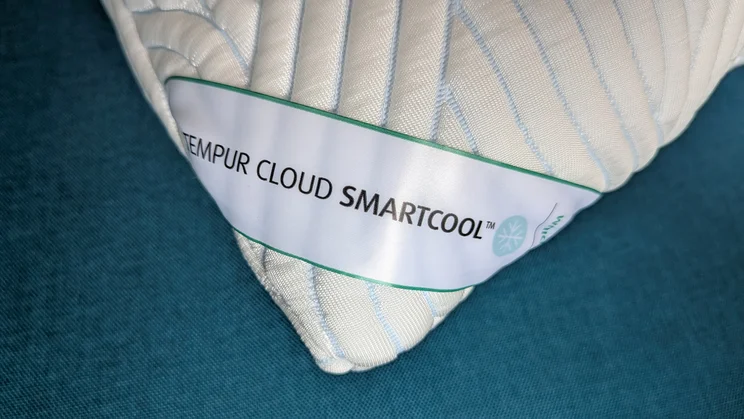 A closeup of the Tempur Cloud SmartCool pillow's corner, and brand label
