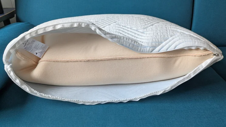 The Tempur Cloud SmartCool pillow with its cover unzipped to show the pillow's inner