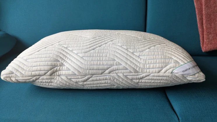 A level view of the Tempur Cloud SmartCool pillow, laid flat on a sofa