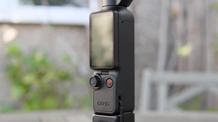 The DJI OSMO Pocket 4P's rear and controls pictured with the touchscreen in portrait mode
