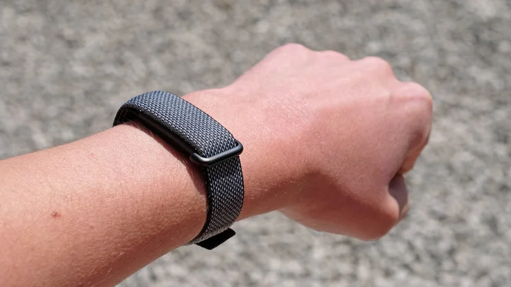 The Fitbit Air pictured on a wrist