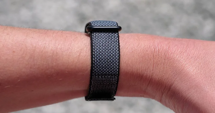 The Fitbit Air pictured on wrist from the side
