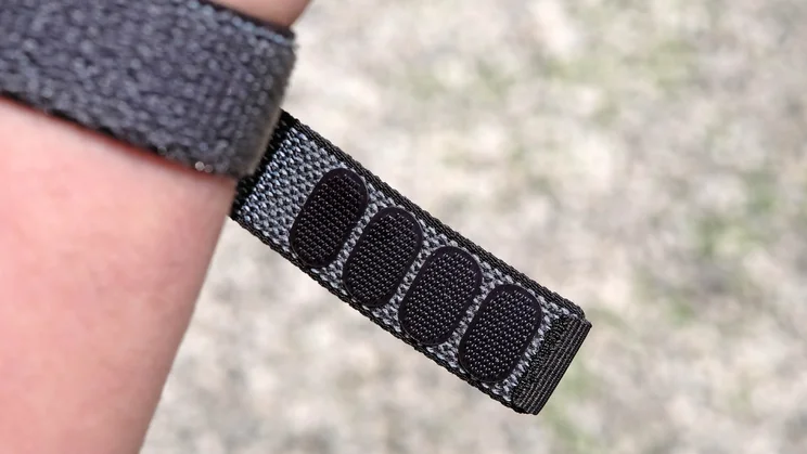 The Fitbit Air's strap, half undone