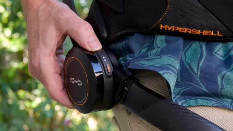 The Hypershell X Ultra S pictured being worn, focusing on the right motor and controls