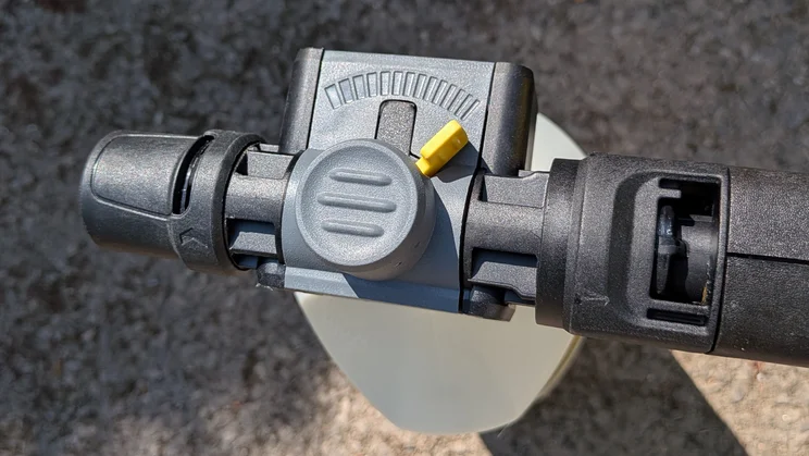 The Karcher K5 Comfort Premium pictured with a close up of the detergent control