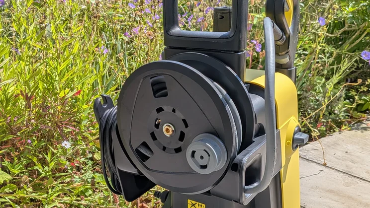 The Karcher K5 Comfort Premium pictured with a focus on the high pressure hose reel at the rear