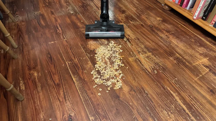 The Miele Triflex HX3 cleaning Cheerios from hard floor