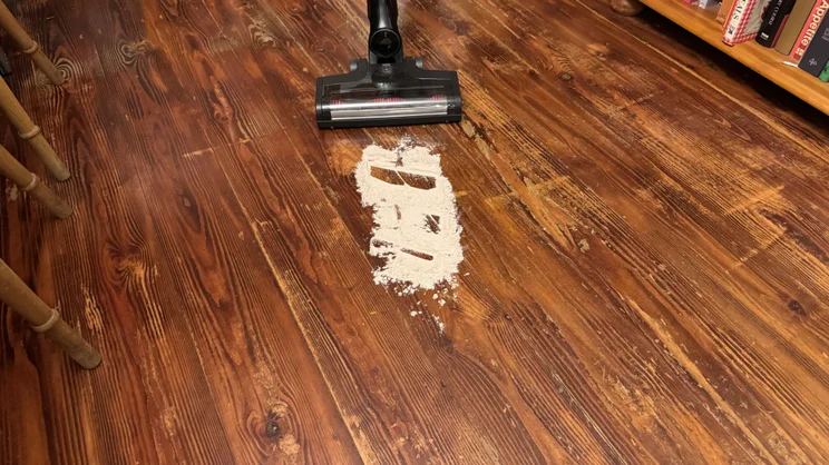 The Miele Triflex HX3 cleaning flour on hard floor