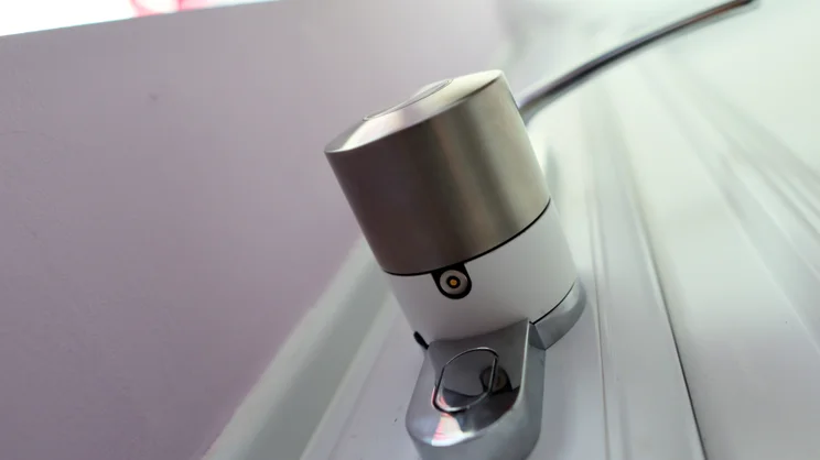 The Ultion Nuki smart lock pictured from below showing the charging attachment