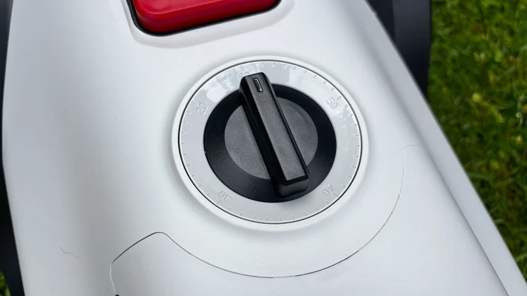 The Eufy Lawn Mower C15's cutting height adjustment dial