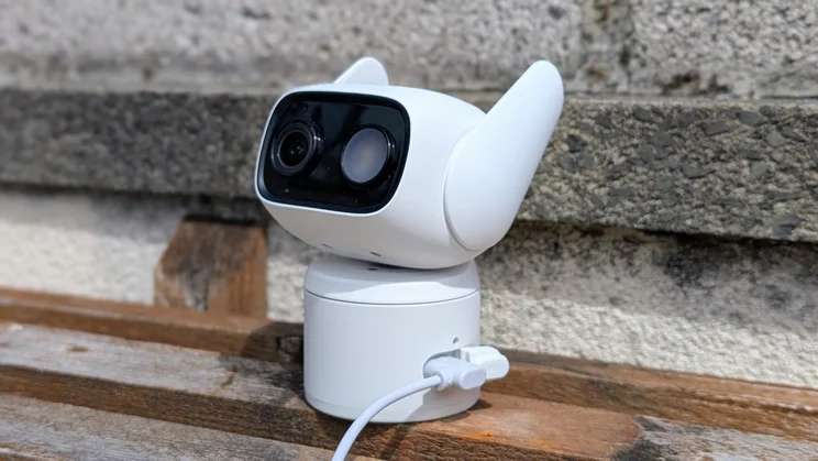 The Eufy Wired Cam C1 security camera plugged in with its Wi-Fi antennae up