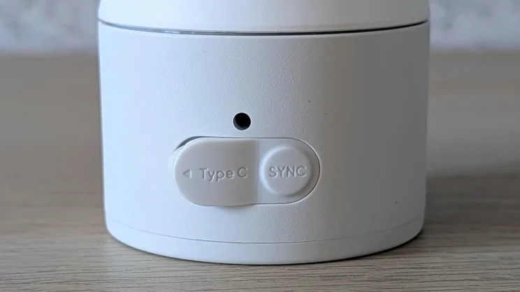 The USB Type-C port and Sync button on the base of the Eufy Wired Cam C1 security camera