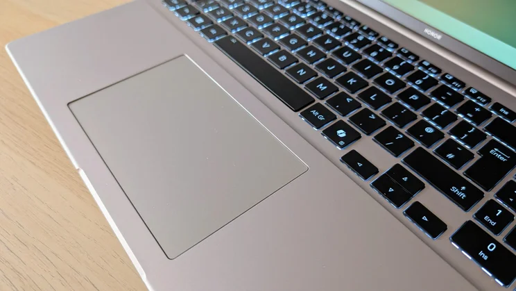 Angled view of the Honor MagicBook 16 laptop's touchpad