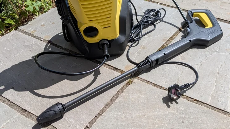Close-up, angled view of the Dirt Blaster lance attached to the K&auml;rcher K3 eco!Booster pressure washer