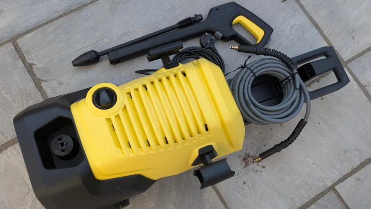 Top-down view of the K&auml;rcher K4 WCM Flex eco!Booster pressure washer with its spray gun disconnected