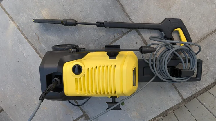 Top-down view of the K&auml;rcher K4 WCM Flex eco!Booster pressure washer on a patio