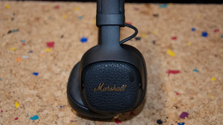 Side view of the outer shell of one of the Marshall Milton ANC on-ear headphones' earpads