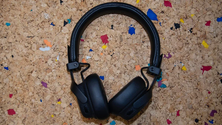 Top-down view of the Marshall Milton ANC on-ear headphones on a cork table