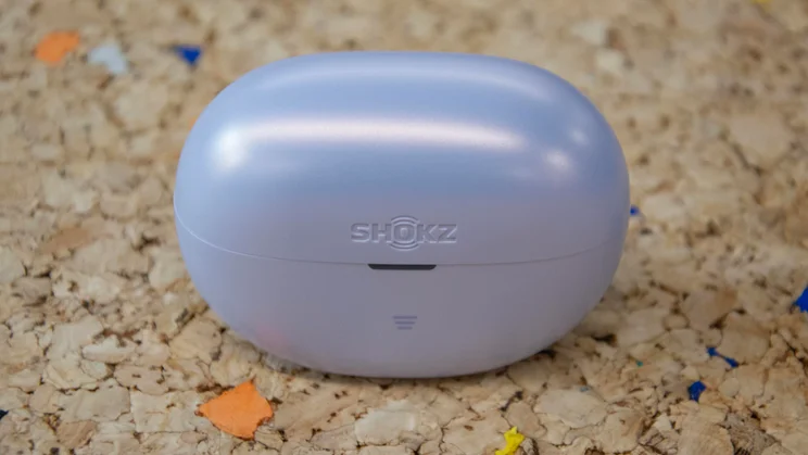 The charging case of the Shokz OpenDots Air open-ear wireless earbuds with the lid closed