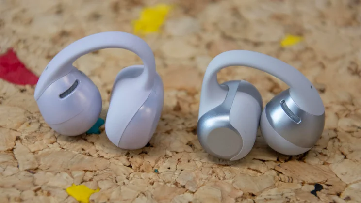One Shokz OpenDots Air earbud next to one Shokz OpenDots 2 earbud for comparison