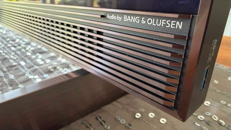 Close-up of the soundbar below the screen of the TCL X11L SQD Mini LED TV