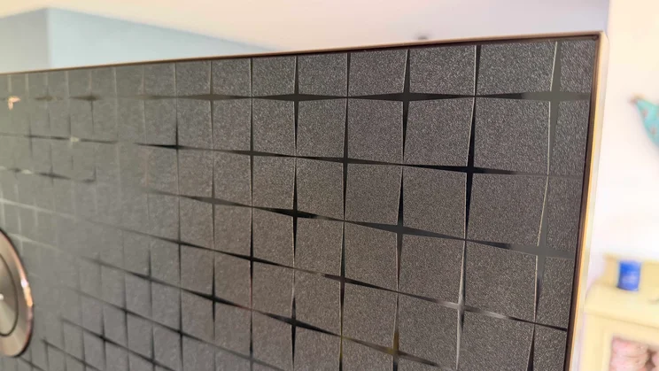 The detail on the rear corner of the TCL X11L SQD Mini LED TV
