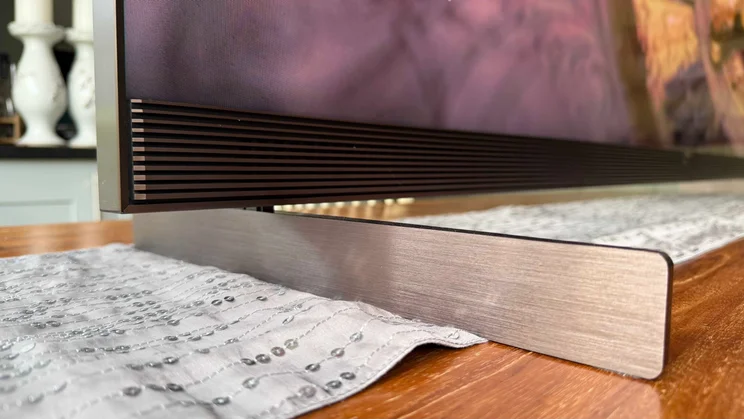 Close-up of the right foot of the TCL X11L SQD Mini LED TV