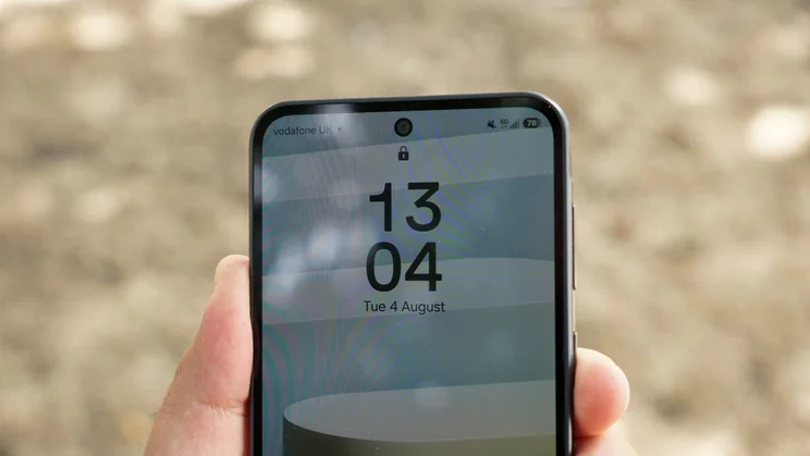 Balance Phone in hand, close up of selfie camera