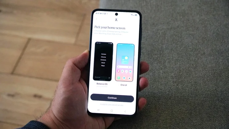 Balance Phone in hand, displaying the two homescreen choices