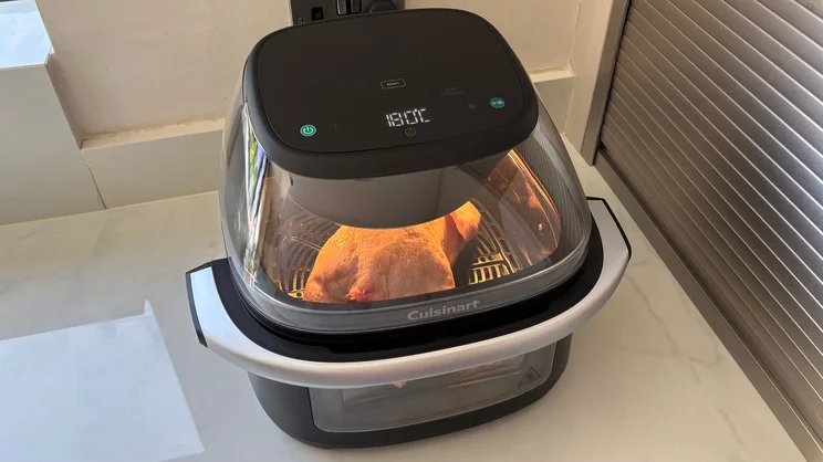 Chicken cooking in the Cuisinart Clearview 9-in-1 air fryer