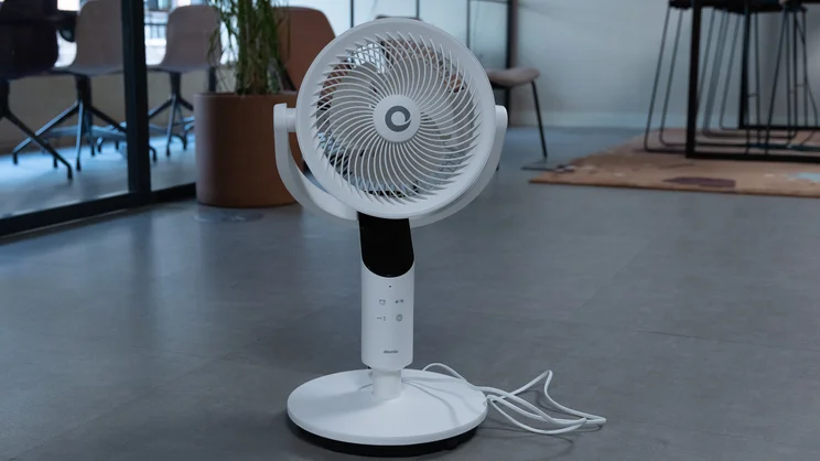 The Devola 8in Low Noise DC Pedestal fan - in floor mode configuration - on the floor of an office