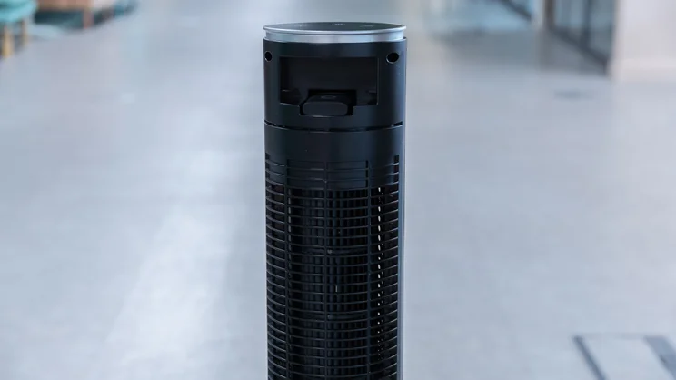 A closeup of the rear of the Devola Platinum 38in DC Tower Fan's top half, in an office