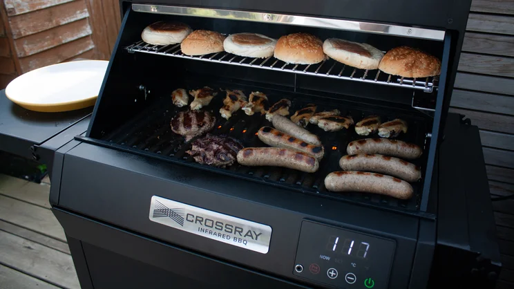 Meats and buns cooking on the Dimplex Crossray eXtreme BBQ
