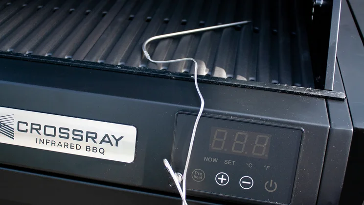The Dimplex Crossray eXtreme BBQ's meat probe, plugged into the grill