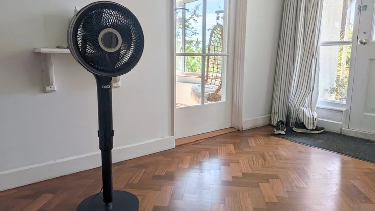 The Dreo Smart TurboPoly Fan 765S in its pedestal configuration in a well-lit room
