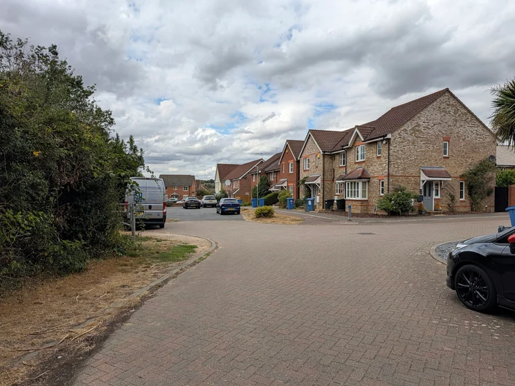 A quiet close of houses on a grey day