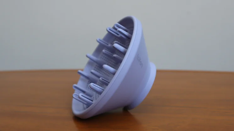 The Laifen Neo hair dryer's diffuser nozzle on a table