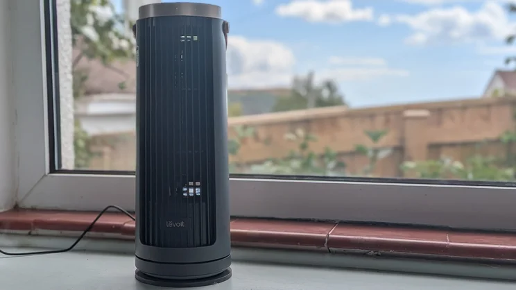 The Levoit Windi Mini Pro fan on a windowsill