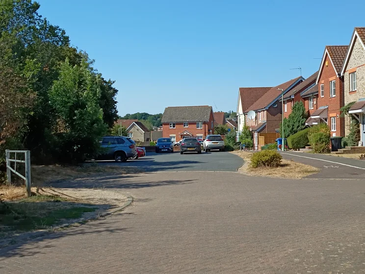 2x zoom of a close of houses on a bright day