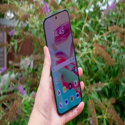 Motorola Moto G77 in hand, front view