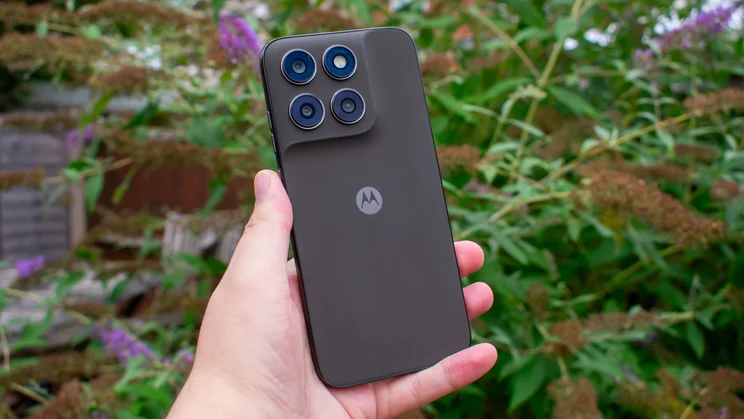 Motorola Moto G77 in hand, rear view