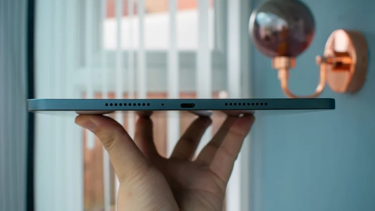 Oppo Pad 5 in hand, bottom view