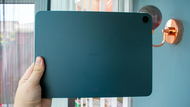 Oppo Pad 5 in hand, rear view