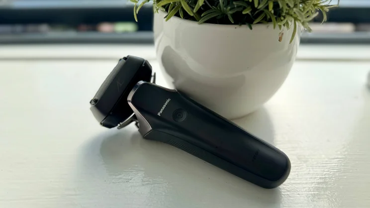 The Panasonic Series 900+ electric shaver on a windowsill